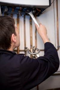 Man installing boiler 